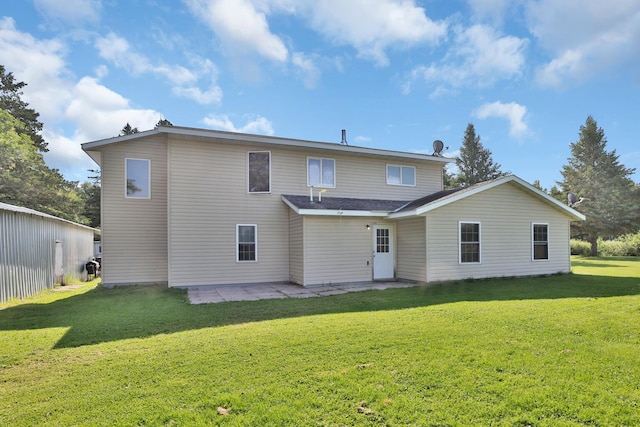 75309 Twin Oaks Rd, Bremen Twp, MN 55735 - rear view of house with a lawn and a patio area