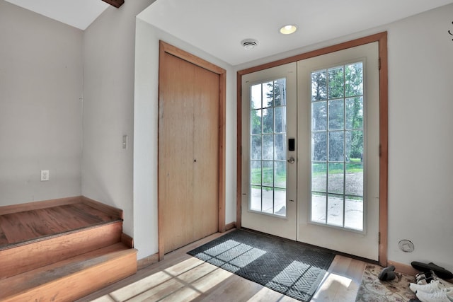 75309 Twin Oaks Rd, Bremen Twp, MN 55735 - doorway featuring french doors and wood finished floors
