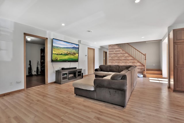 75309 Twin Oaks Rd, Bremen Twp, MN 55735 - living room with stairway, light wood-style floors, and recessed lighting