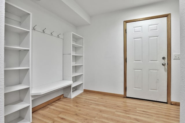 75309 Twin Oaks Rd, Bremen Twp, MN 55735 - mudroom with wood finished floors and baseboards