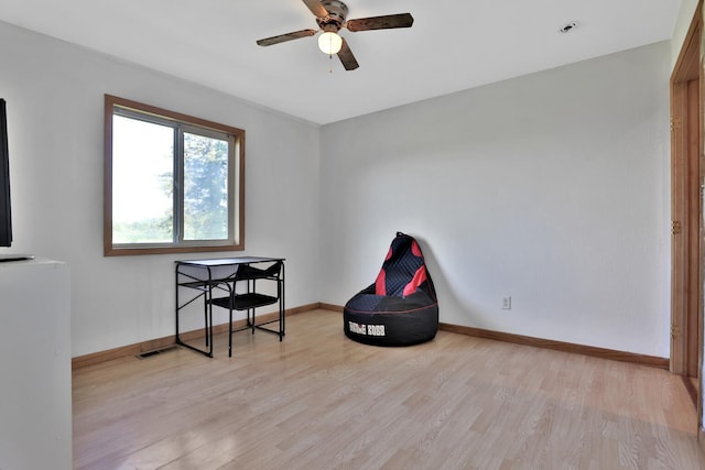 75309 Twin Oaks Rd, Bremen Twp, MN 55735 - sitting room featuring wood finished floors and ceiling fan