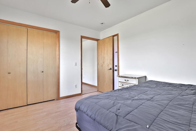 75309 Twin Oaks Rd, Bremen Twp, MN 55735 - bedroom featuring light wood-type flooring, a closet, and a ceiling fan