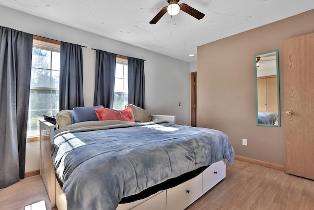 75309 Twin Oaks Rd, Bremen Twp, MN 55735 - bedroom featuring light wood-style floors and ceiling fan