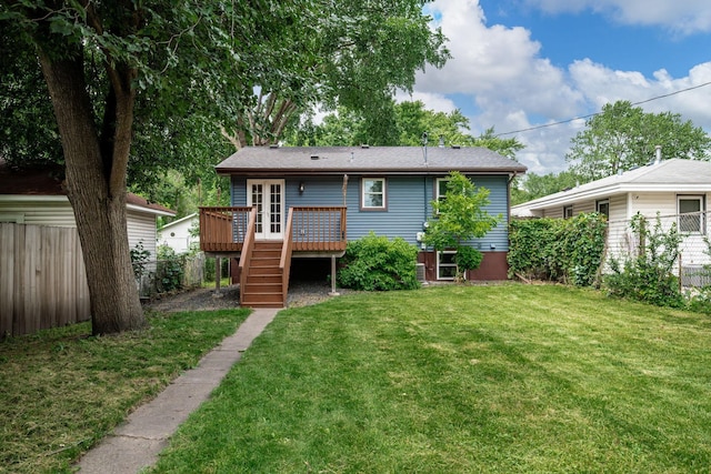 711 Quincy St NE, Minneapolis, MN 55413 - back of property featuring a deck, stairway, and french doors