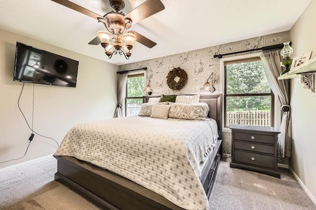 791 139th Ln NW, Andover, MN 55304 - bedroom with light carpet and a ceiling fan