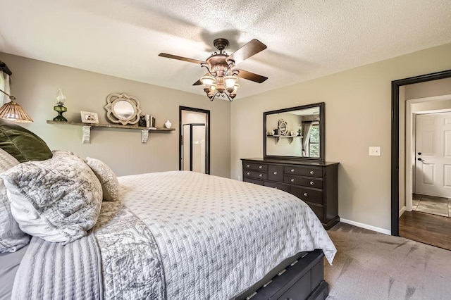 791 139th Ln NW, Andover, MN 55304 - bedroom with dark carpet and ceiling fan