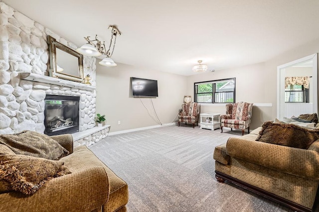 791 139th Ln NW, Andover, MN 55304 - living room featuring carpet floors and a stone fireplace