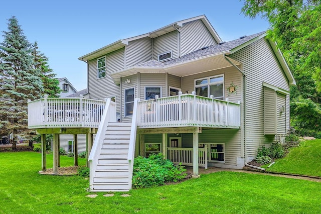 791 139th Ln NW, Andover, MN 55304 - back of house with stairs, a deck, and a lawn