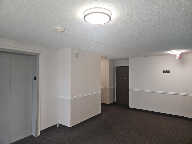 1855 Silver Bell Rd Unit 301, Eagan, MN 55122 - unfurnished room featuring a textured ceiling, a smoke detector, and elevator