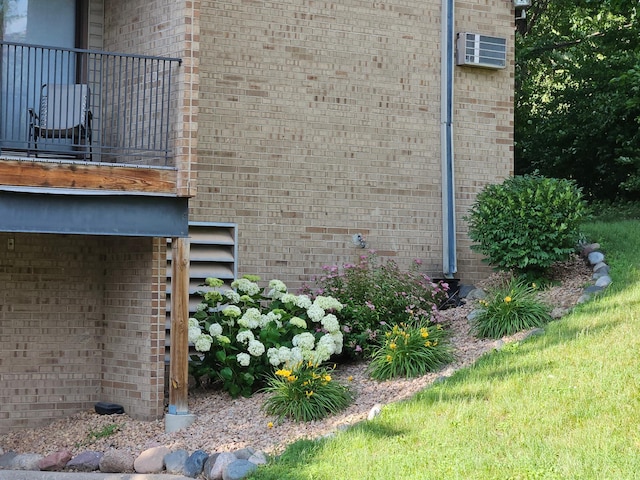 1855 Silver Bell Rd Unit 301, Eagan, MN 55122 - view of home's exterior with a balcony and brick siding