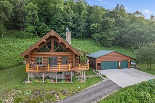 30453 County Road 19, Wiscoy Twp, MN 55971 - log home with a garage, an outbuilding, a chimney, log exterior, and a front lawn