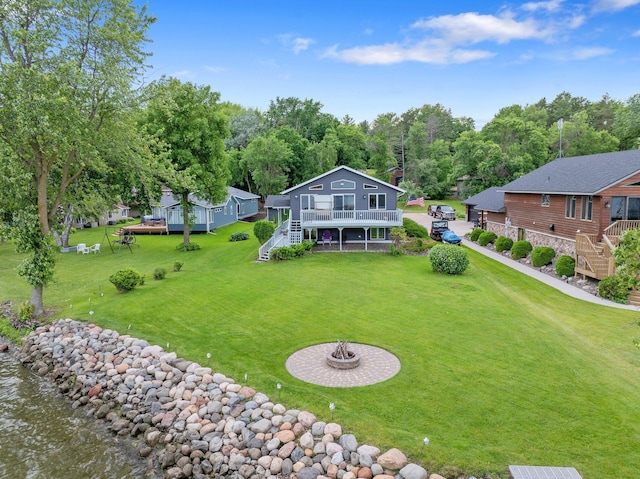 50945 Almond Ave, Nessel Twp, MN 55080 - back of property with stairs, a wooden deck, and a yard