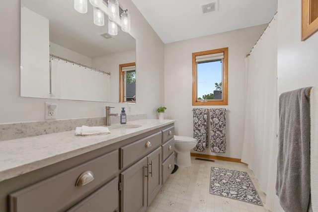 50945 Almond Ave, Nessel Twp, MN 55080 - full bathroom featuring vanity, plenty of natural light, and tile patterned floors