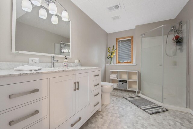 50945 Almond Ave, Nessel Twp, MN 55080 - full bath with a stall shower, vanity, tile patterned floors, and a drop ceiling