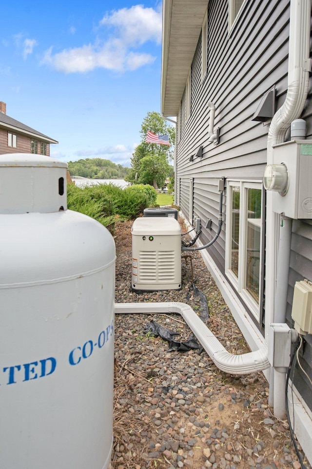 50945 Almond Ave, Nessel Twp, MN 55080 - exterior view of a power unit and gas tank