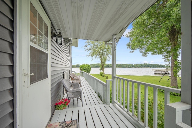 50945 Almond Ave, Nessel Twp, MN 55080 - wooden terrace featuring a water view and a yard