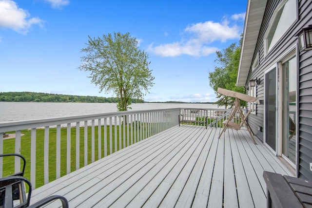 50945 Almond Ave, Nessel Twp, MN 55080 - wooden deck with a water view and a yard