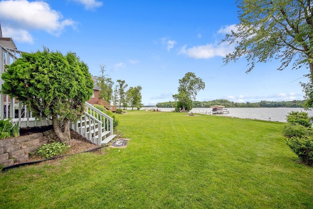 50945 Almond Ave, Nessel Twp, MN 55080 - view of grassy yard featuring a water view and stairway