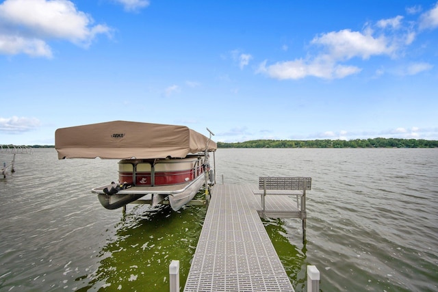 50945 Almond Ave, Nessel Twp, MN 55080 - dock area featuring boat lift and a water view