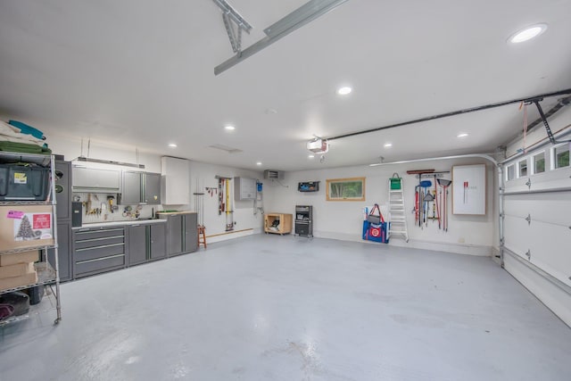 50945 Almond Ave, Nessel Twp, MN 55080 - garage with a garage door opener and recessed lighting
