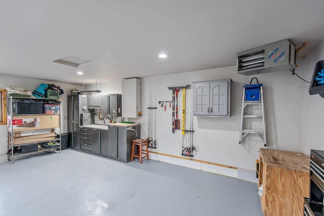 50945 Almond Ave, Nessel Twp, MN 55080 - garage with recessed lighting and a heating unit