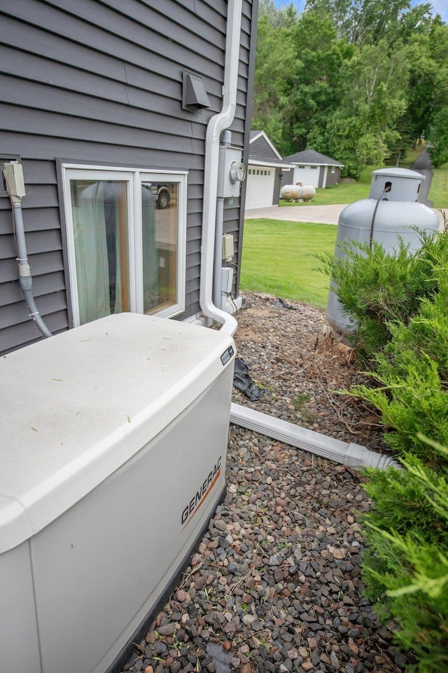 50945 Almond Ave, Nessel Twp, MN 55080 - exterior view of a power unit and propane tank