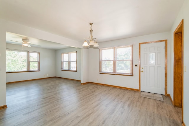 3654 Lyndale Ave N, Minneapolis, MN 55412 - entryway with light wood-style floors, a chandelier, and a ceiling fan