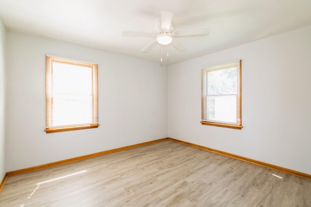 3654 Lyndale Ave N, Minneapolis, MN 55412 - empty room featuring wood finished floors and ceiling fan