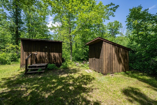 40936 Yost Rd, Emily, MN 56447 - view of green lawn featuring a storage unit