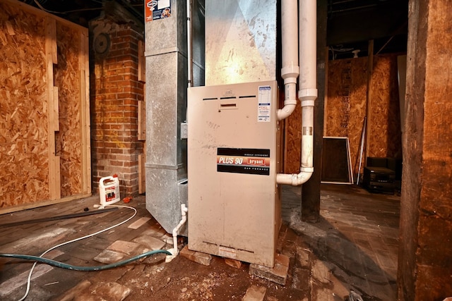 159 King St, Winona, MN 55987 - utility room featuring heating unit