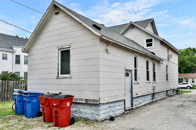 159 King St, Winona, MN 55987 - view of property exterior featuring roof with shingles