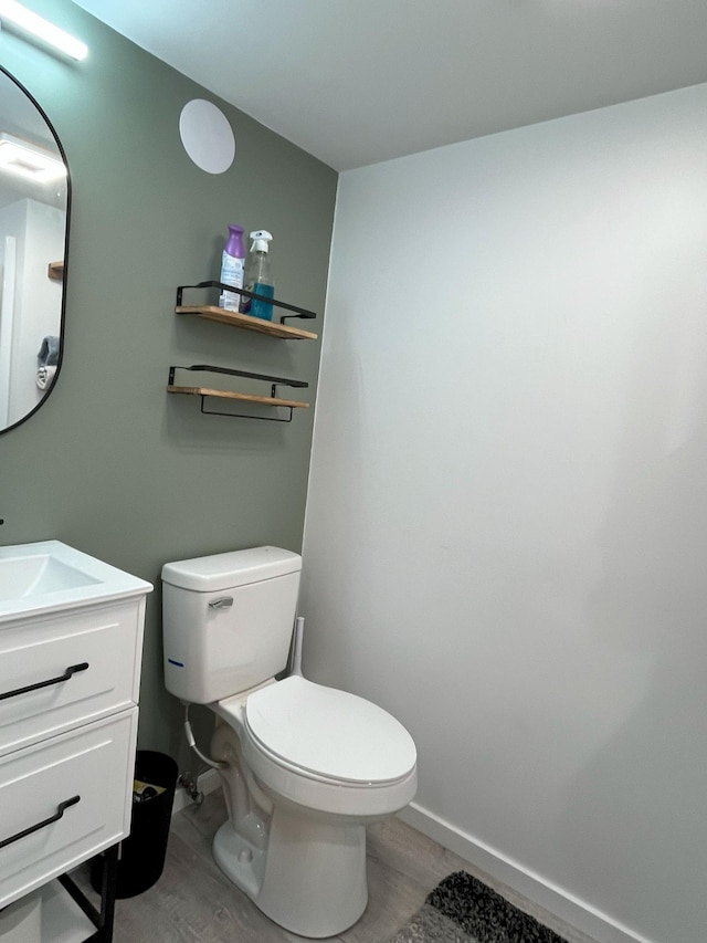 1304 3rd St NW, Austin, MN 55912 - bathroom with wood finished floors and vanity
