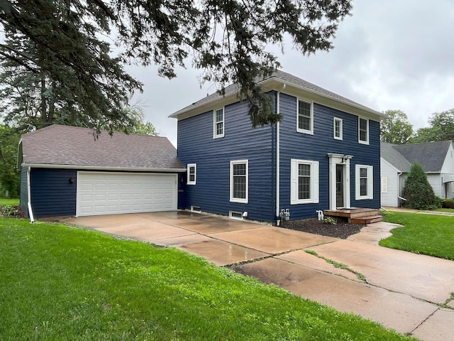 1304 3rd St NW, Austin, MN 55912 - colonial house featuring a front yard and driveway