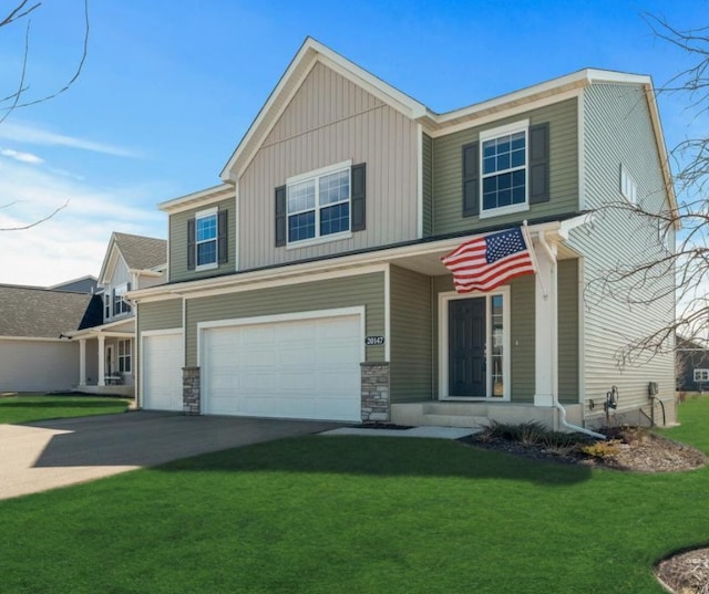 20147 79th Ave, Corcoran, MN 55340 - view of front of property with an attached garage, a front lawn, concrete driveway, board and batten siding, and a porch