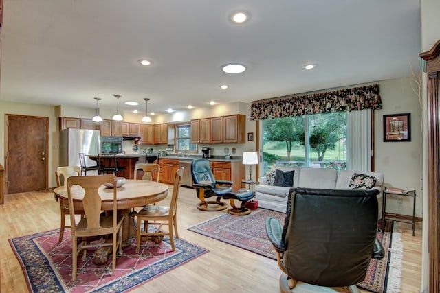 715 River Heights Rd SW, Menomonie, WI 54751 - dining area with light wood finished floors and recessed lighting