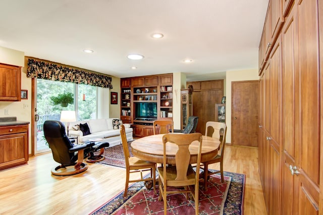 715 River Heights Rd SW, Menomonie, WI 54751 - dining space featuring light wood finished floors and recessed lighting