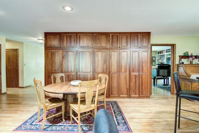 715 River Heights Rd SW, Menomonie, WI 54751 - dining area with light wood finished floors and recessed lighting