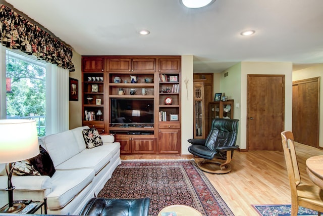 715 River Heights Rd SW, Menomonie, WI 54751 - living area with wood finished floors and recessed lighting