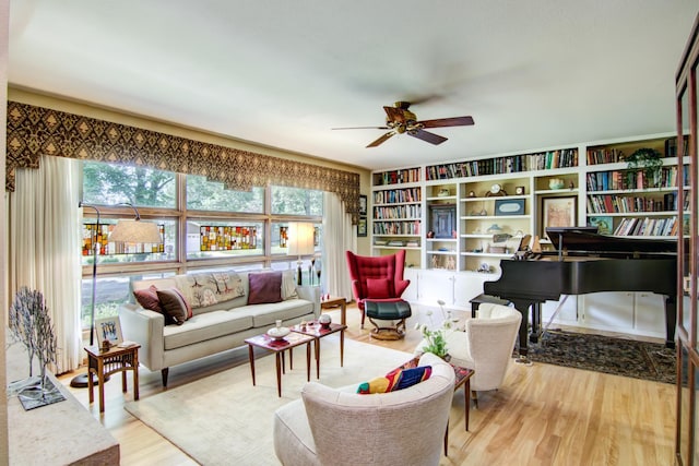 715 River Heights Rd SW, Menomonie, WI 54751 - living area with plenty of natural light, wood finished floors, and ceiling fan