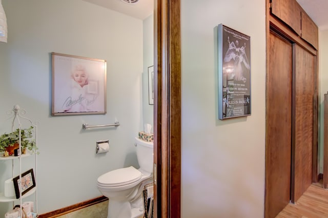 715 River Heights Rd SW, Menomonie, WI 54751 - bathroom featuring toilet and baseboards