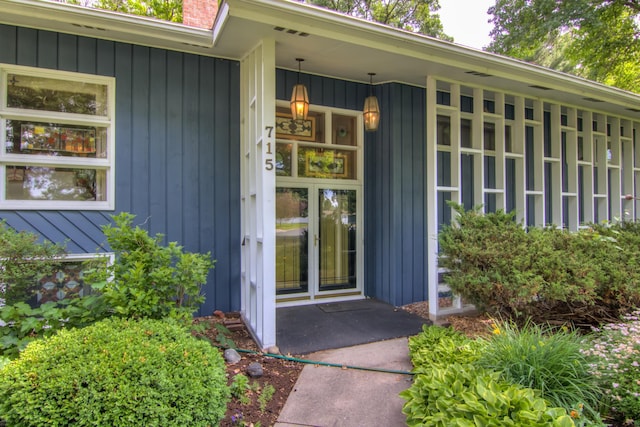 715 River Heights Rd SW, Menomonie, WI 54751 - property entrance featuring a chimney