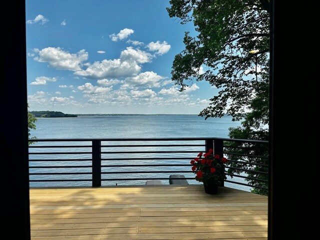 8766 Interlachen Rd, Lake Shore, MN 56468 - wooden deck featuring a water view