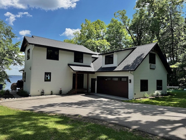 8766 Interlachen Rd, Lake Shore, MN 56468 - modern farmhouse style home featuring asphalt driveway, a shingled roof, and a garage