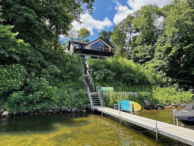 8766 Interlachen Rd, Lake Shore, MN 56468 - dock area featuring stairway and a water view