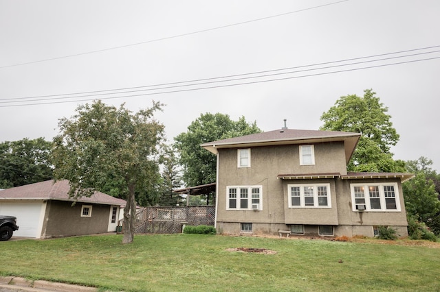 605 Chestnut St, Ellsworth, MN 56129 - back of house with a lawn and stucco siding