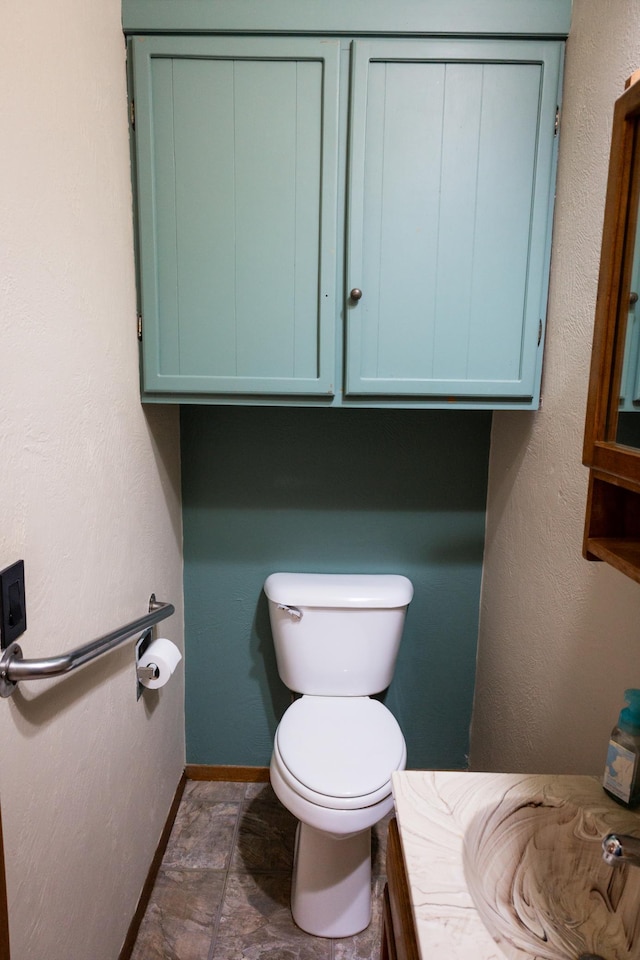 605 Chestnut St, Ellsworth, MN 56129 - half bath with stone finish flooring and vanity