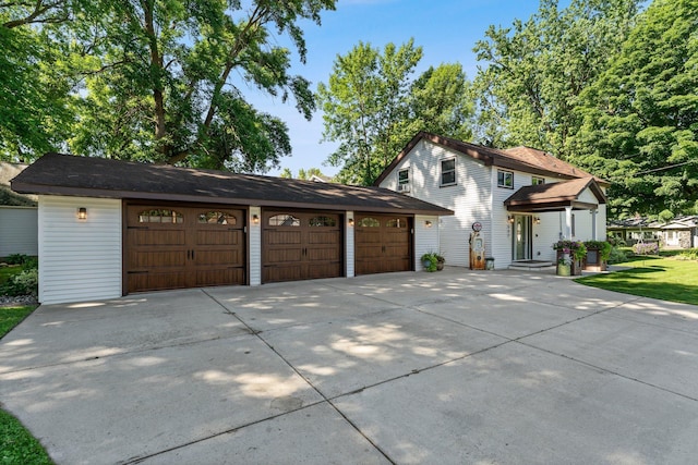 640 3rd St N, Dassel, MN 55325 - view of front of home with an attached garage and driveway