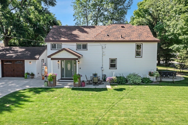 640 3rd St N, Dassel, MN 55325 - back of property with concrete driveway and a lawn