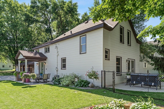 640 3rd St N, Dassel, MN 55325 - rear view of house with a patio