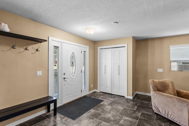 640 3rd St N, Dassel, MN 55325 - entryway featuring baseboards and cooling unit
